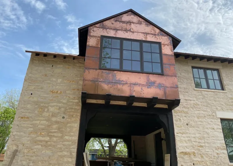 Copper metal panel facade on a stone building for Metal Roof Coating in Parma Heights