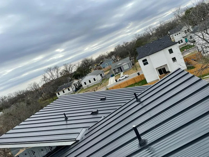 Standing seam metal roof panels with vents for Skylight Repair in Parma Heights